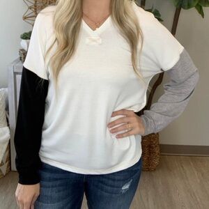 White V-Neck Top with Black and Gray Sleeves